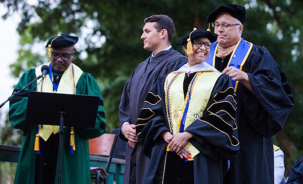 A student graduating with their doctorate.